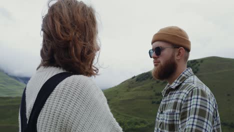 couple enjoying a scenic mountain view