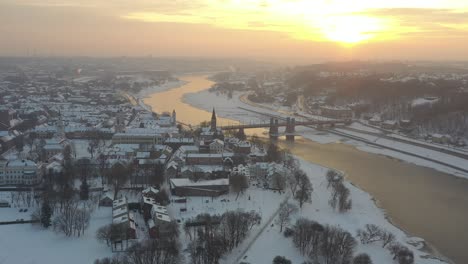 Aerial view of Kaunas city in the sunny winter evening. Lithuania