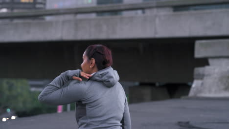 fitness, woman and stop to relax in a city