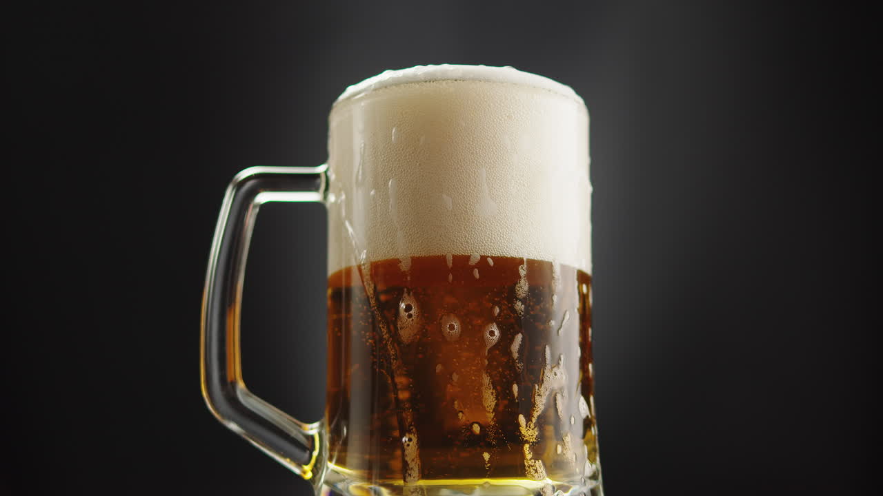 Glass of Beer with Frothy Foam