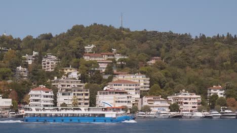 wealthy residential district bosphorus strait with daily ferry cruise boat