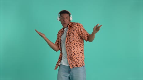 cheerful african american guy dancing to music