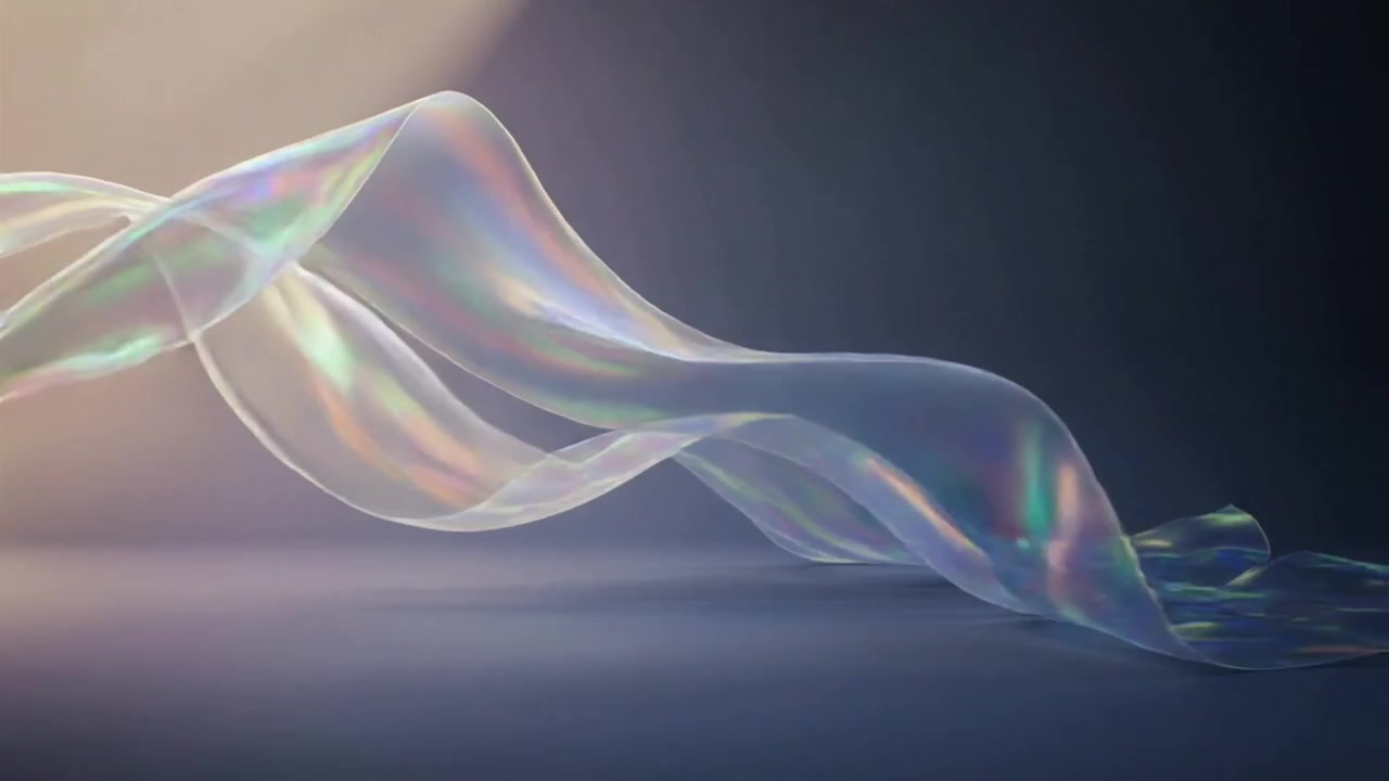 Animation starting iridescent film unfurling on studio floor to show refractions under left light