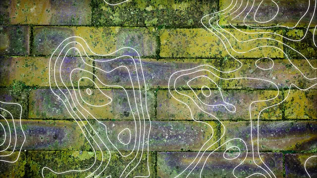 노란색 벽돌 벽 배경 위에 움직이는  ⁇ 색 윤 ⁇  선의 애니메이션