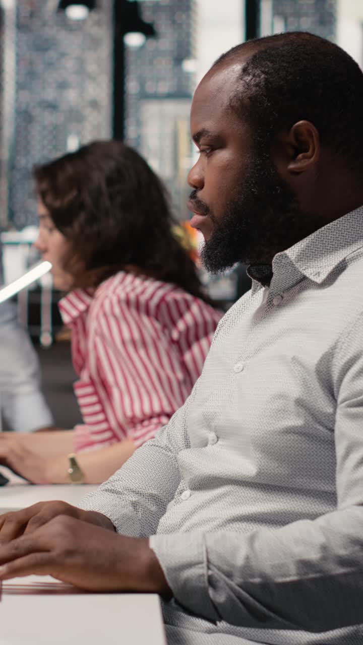 Vertical Video Black Male Game Developer Creating Futuristic Space Video Game
