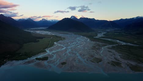 amazing river delta running down from snow capped mountains in glenorchy, new zealand