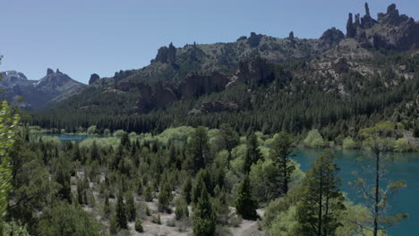 aerial - limay river and forest in valle encantado, patagonia, neuquen, argentina, forward reveal