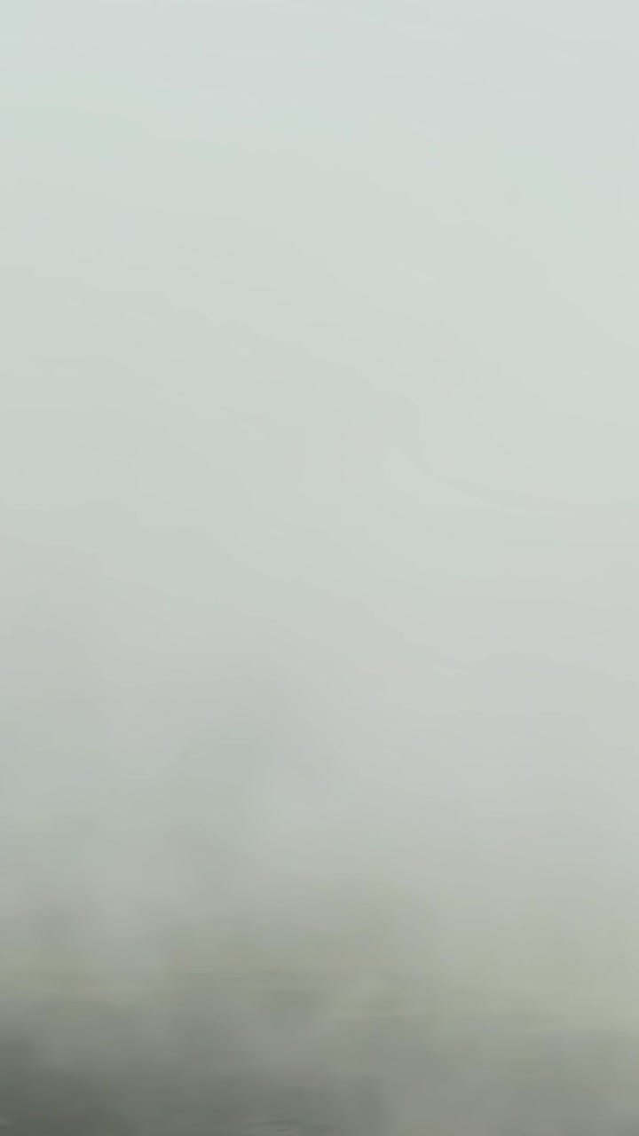 Misty Fog Covering Volcanic Mountain Valley