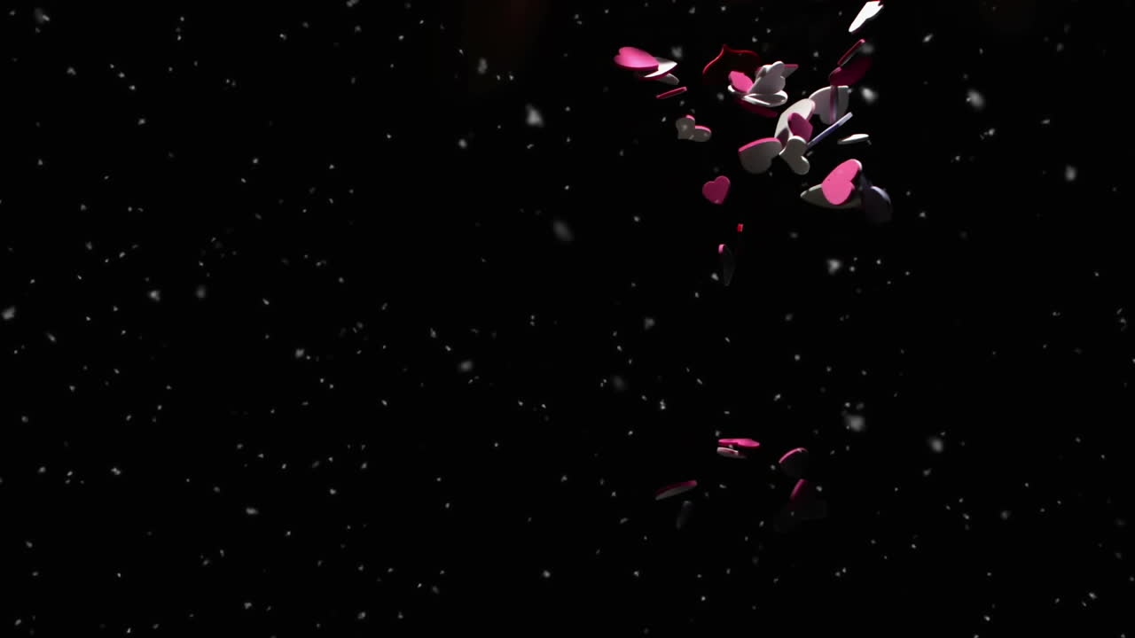 검은 바탕에 떨어지는 콘페티와 분홍색 심장의 애니메이션