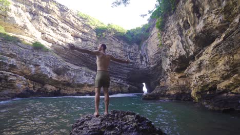 young man spending time on sea cliffs.