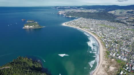 Aerial-View-Of-The-Whangamata-Holiday-Destination-On-The-Coromandel-Peninsula,-North-Island-In-New-Zealand