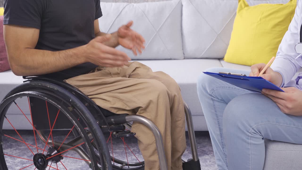 Disabled Person's Health, Man In Wheelchair Being Examined By Doctor.
