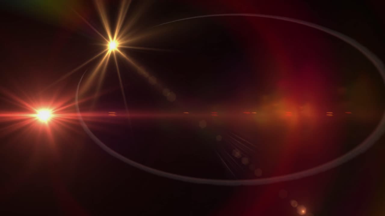 tres puntos de luz contra un fondo negro