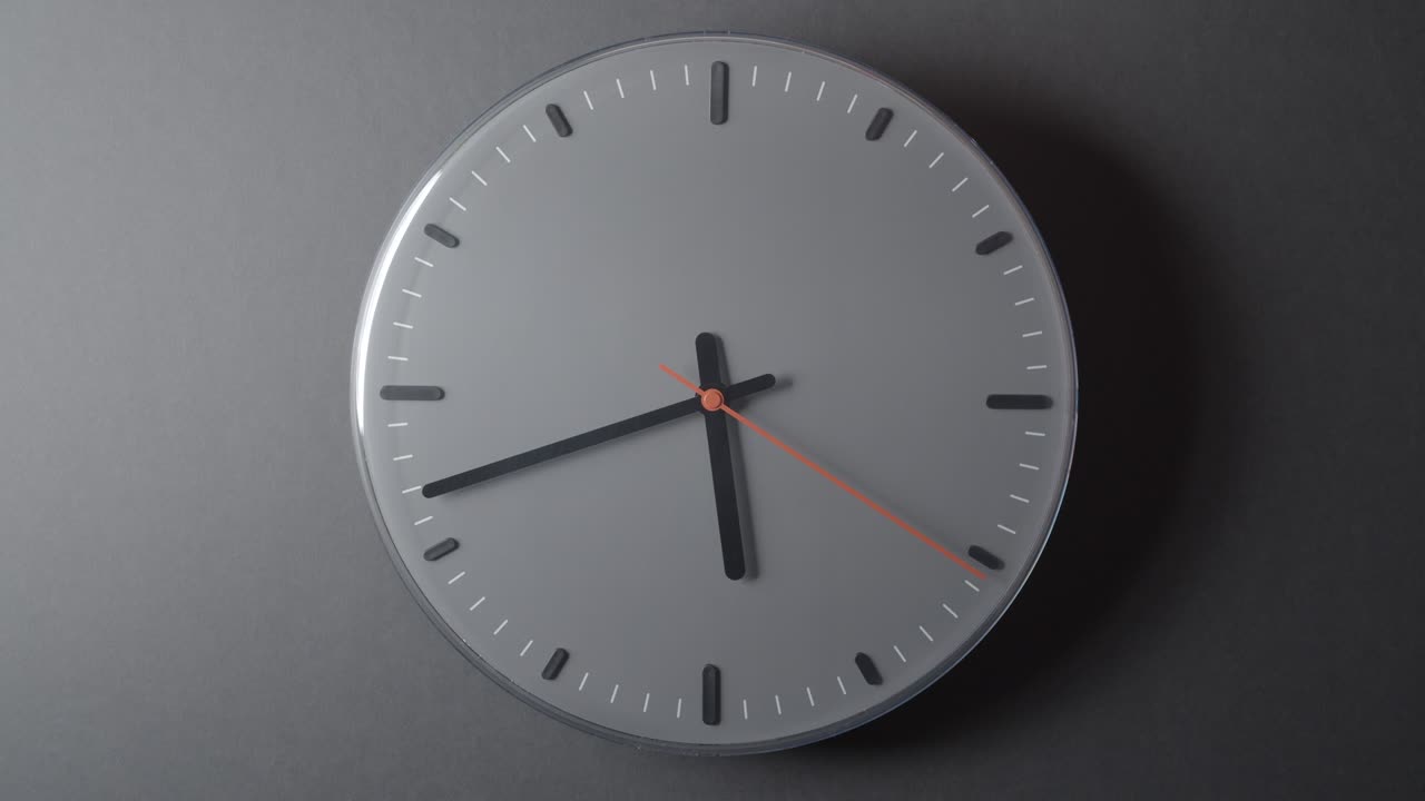 Clock Face in Time lapse full day on dark grey wall