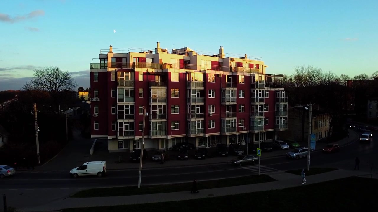 Aerial view of a drone flying over the residential building.