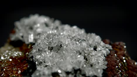 seamlessly rotating a mineral (quartz on pyrite) in front of black background