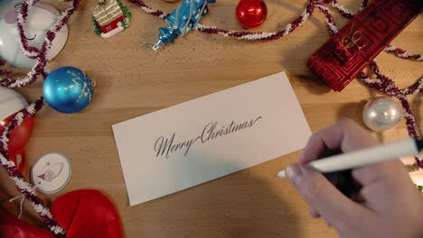 a handwritten letter that says merry christmas