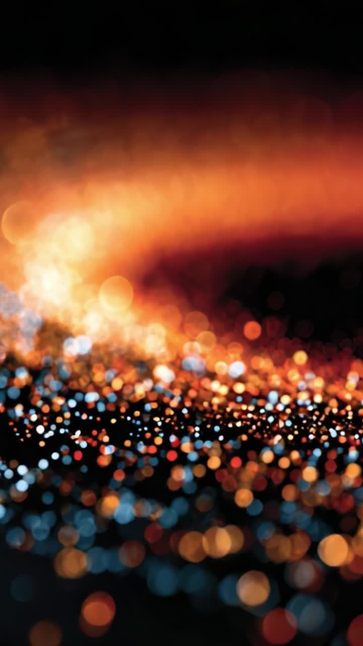 Uno spettacolo ipnotico di colori vivaci in una scena eterea e scintillante: vortici di particelle creano un'esperienza visiva mozzafiato che cattura luce e movimento