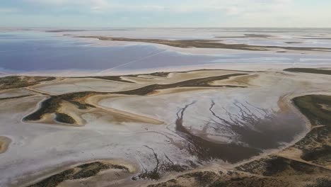 lake tyrrell, vic, australia. drone tilting up to reveal shallow salt lake