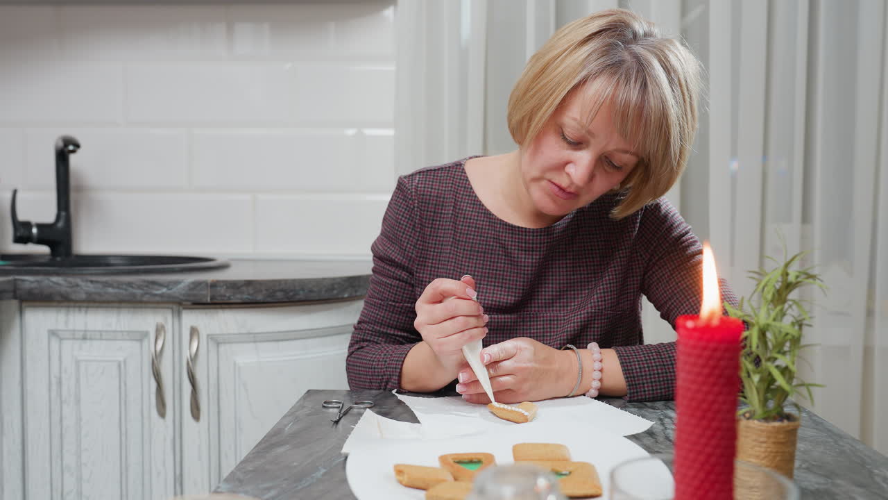 Young woman decorating cookies with icing in cozy kitchen, soft lighting, focus on hands and cookie detail, festive atmosphere, holiday baking