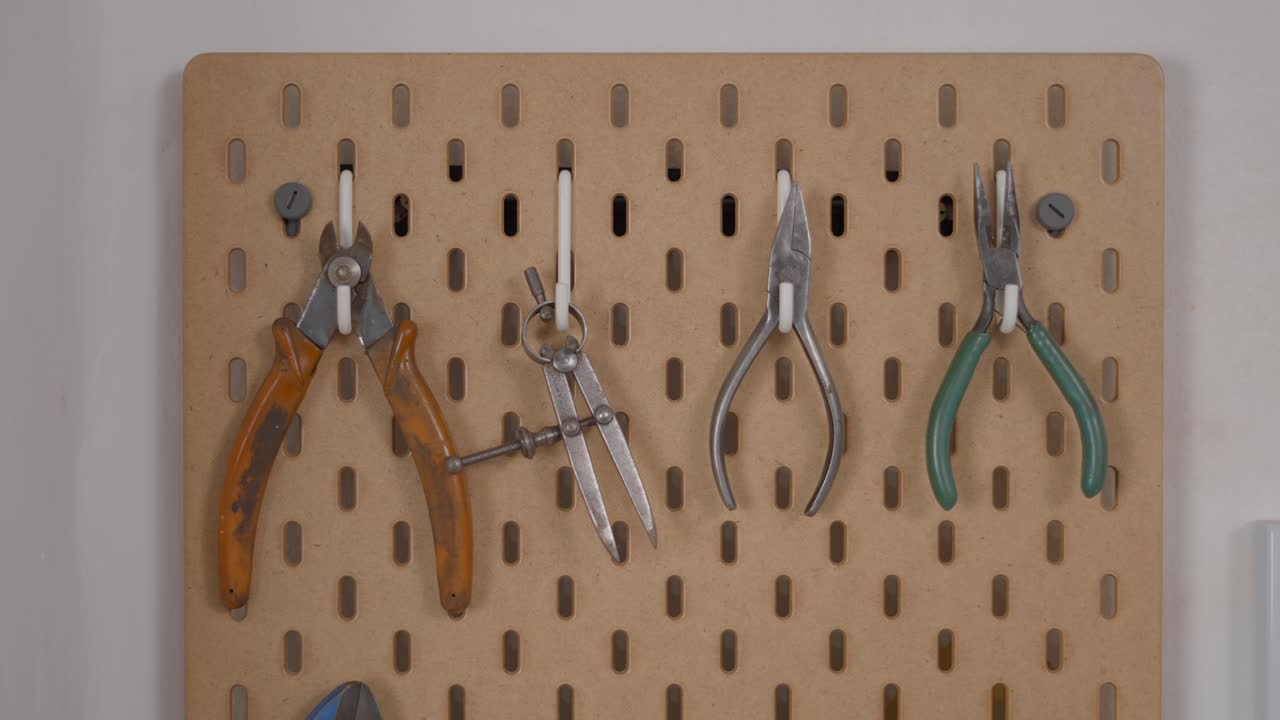 Organized Workshop Tools on Pegboard