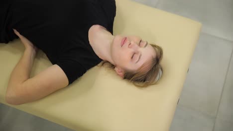 woman undergoing physical therapy session