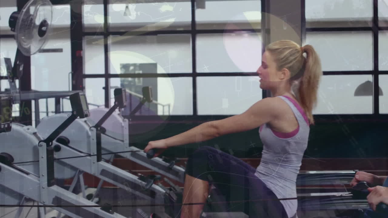 Animation of financial data processing over caucasian couple exercising on gym