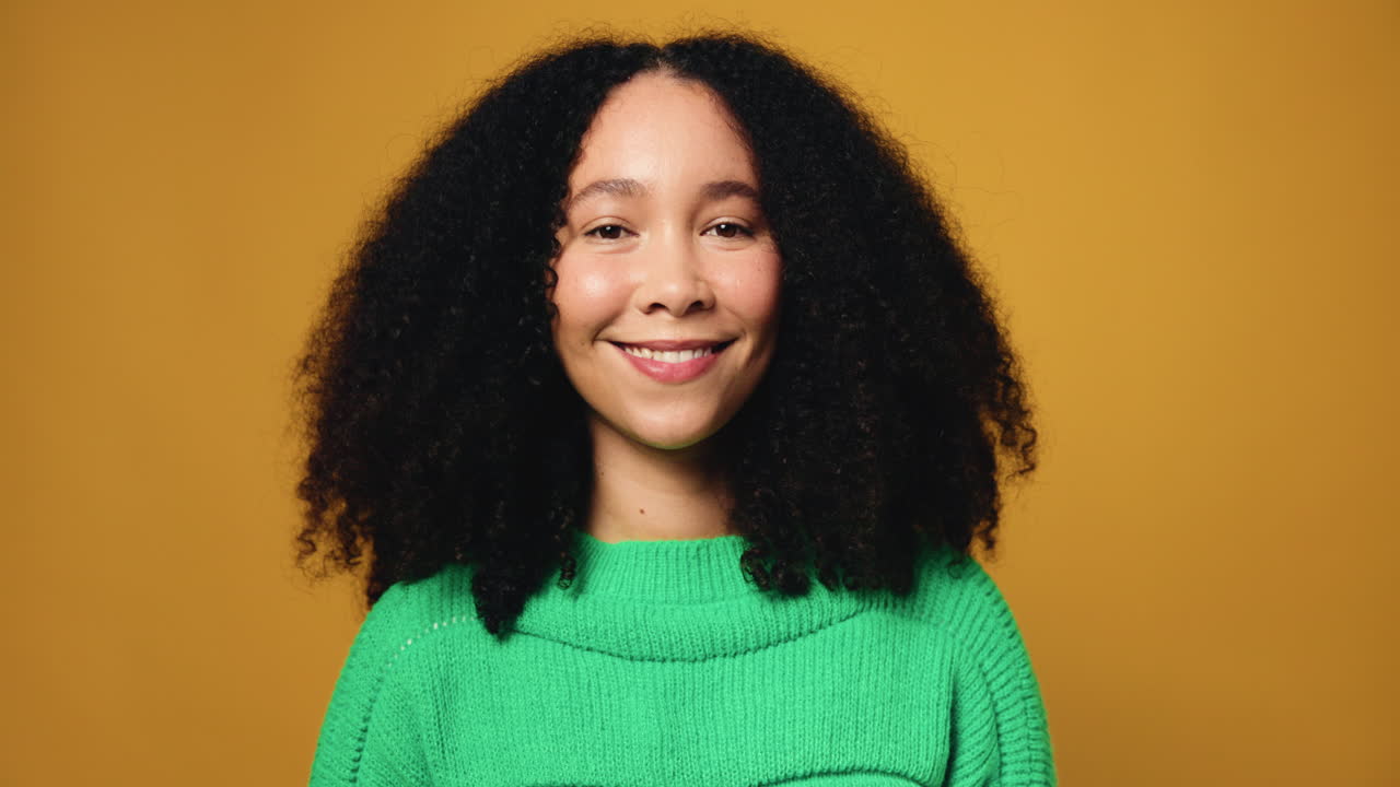 Portrait of a Smiling Woman with Curly Hair
