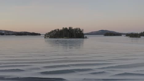 island trapped in frozen moosehead lake