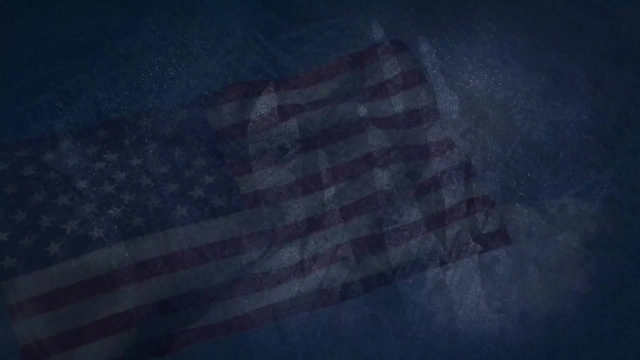 Breeze picking up triggers American flag stripes lifting and billowing before settling into flutter