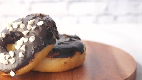 chocolate glazed donuts with white chocolate chips