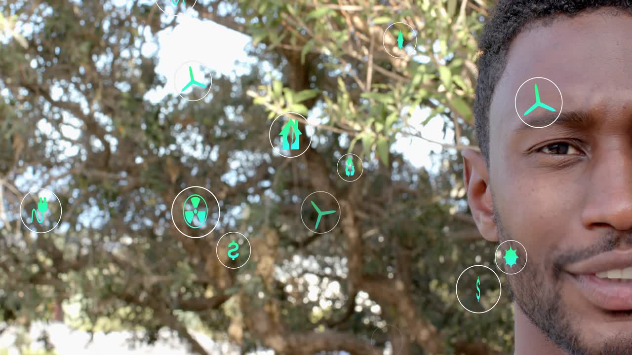 Man smiling at camera as overlay starts, green icons drifting across face, showing sustainability
