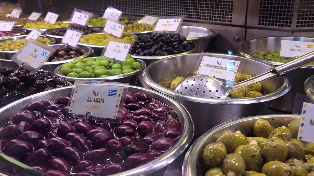 Pan Left Close Up of an Olive Bar