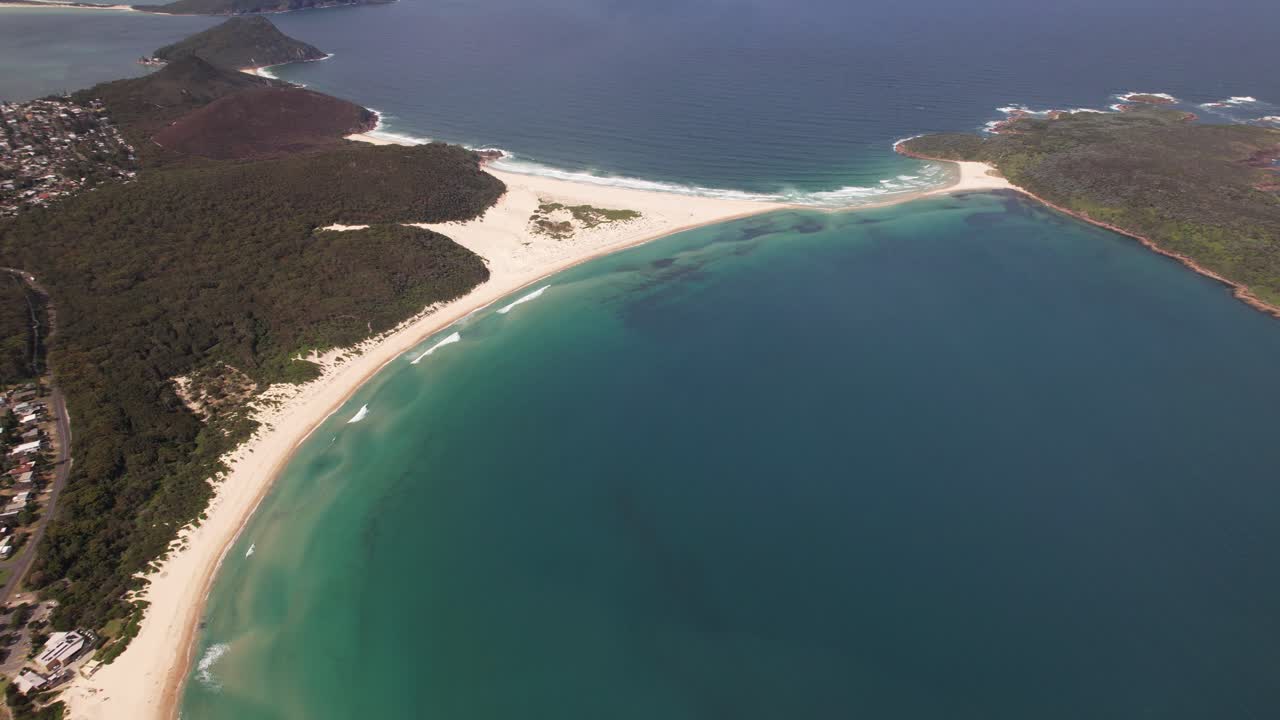 Panorama Of Fingal Island With White Sand Spit And Beach On Fingal Bay, NSW, Australia. aerial panning shot
