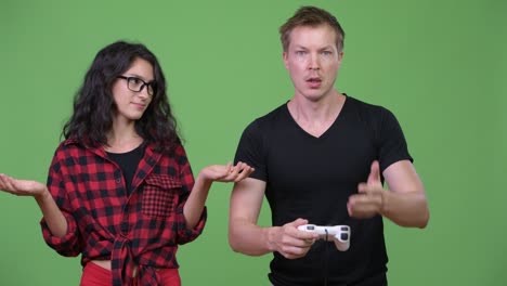 young couple playing games together