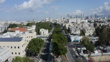 New-light-train-passing-through-Tel-Aviv,-mass-transit-in-suburban-area