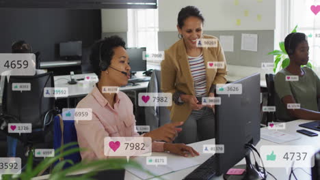 Animation-of-notification-bars-over-diverse-female-coworkers-discussing-on-desk-in-office