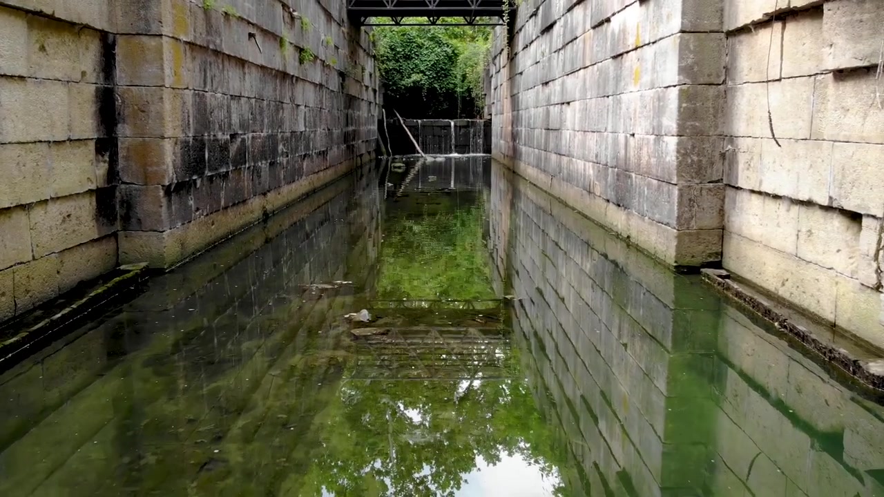 Drone flying through water locks in Toledo, OH.