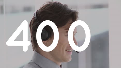 animation of changing numbers over man wearing phone headset