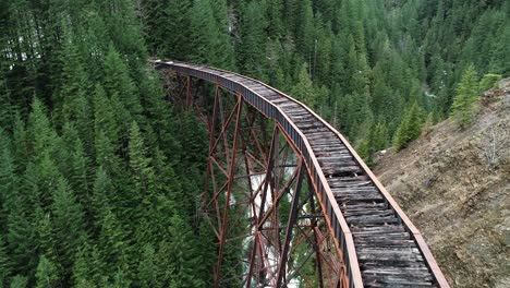 aerial view of ladner creek trestle, abandoned bridge of kettle valley railway, british columbia canada, drone shot