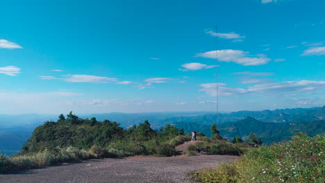 lovers standing at the top of the mountain