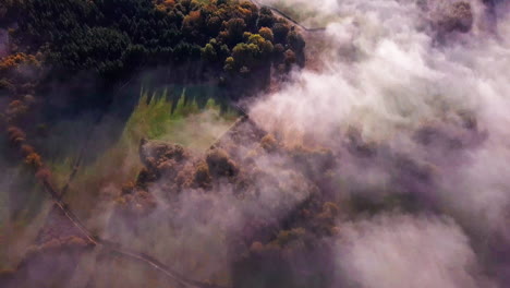 Top-Down-Aerial-Shot-Flying-High-Above-the-Clouds-of-Camino-De-Santiago-Route-in-Spain