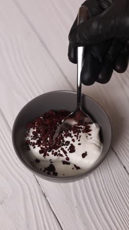 preparing chocolate yogurt dessert