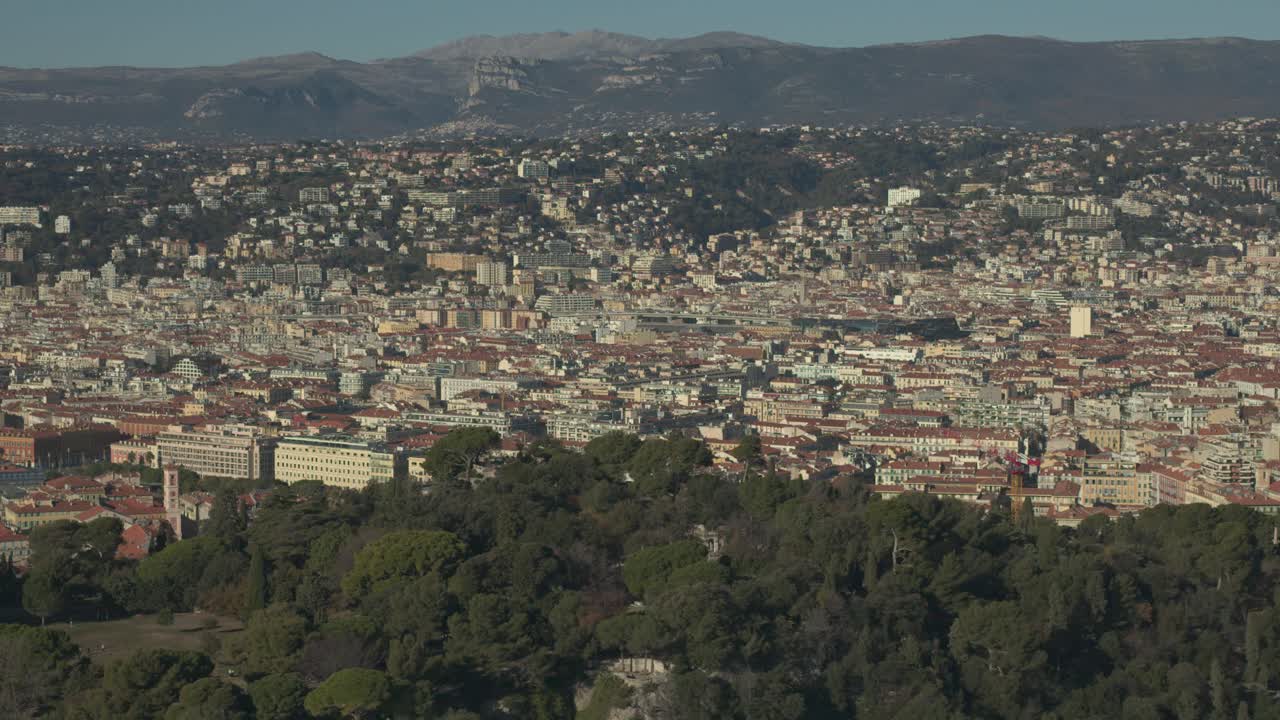 Aerial view in French Riviera in Nice during summer day
Long travelling drone shot in the french riviera during summer
We can see buildings and mountains in background