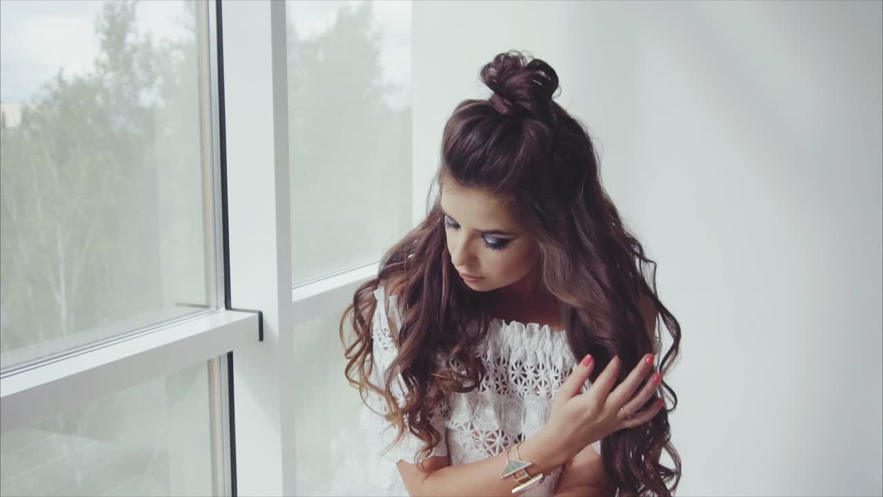 la mujer de la ventana.