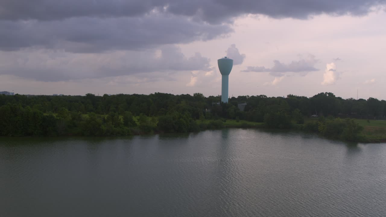 Drone Flyover of Brays Bayou and Blue Water Tower Landmark in Alief, Houston