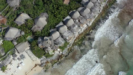 aerial drone flying over accommodation at azulik resort ecolodge, tulum