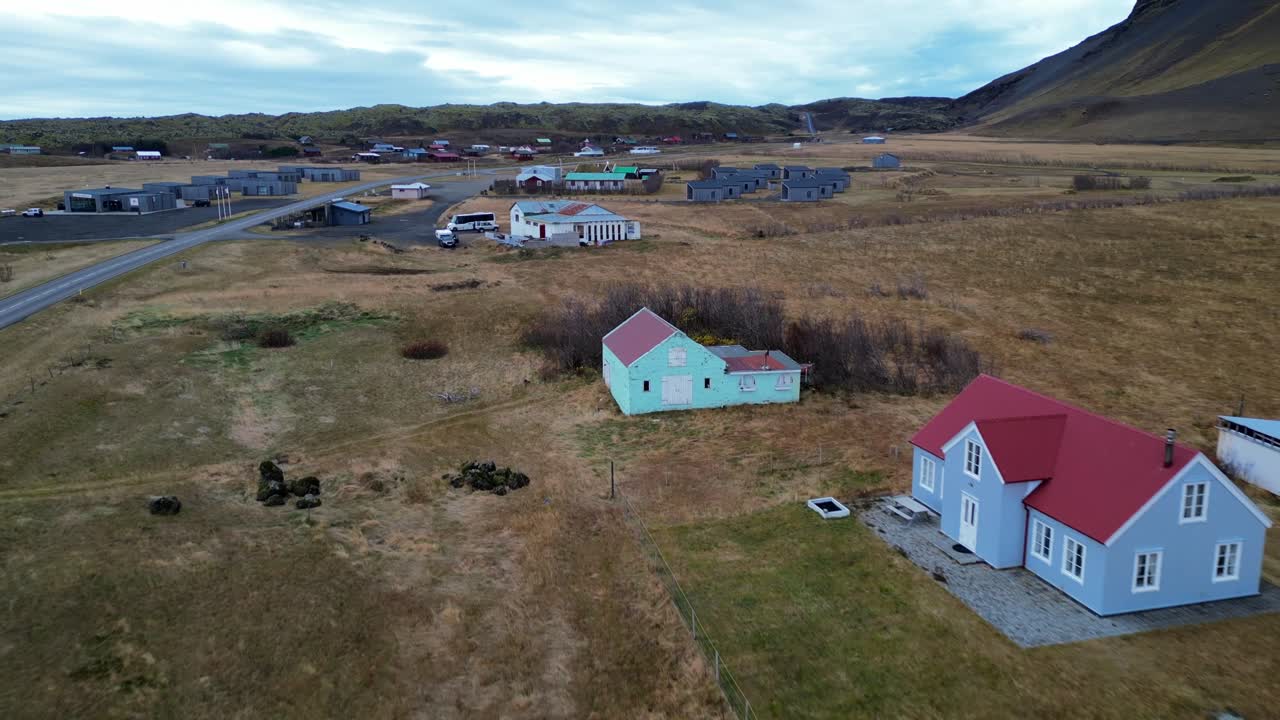 A bird's-eye view of a small village and traditional houses in Skeidararsandur, Iceland
