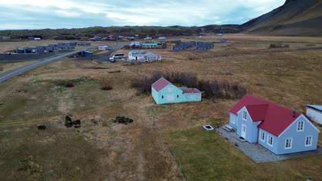 A bird&#039;s-eye view of a small village and traditional houses in Skeidararsandur, Iceland