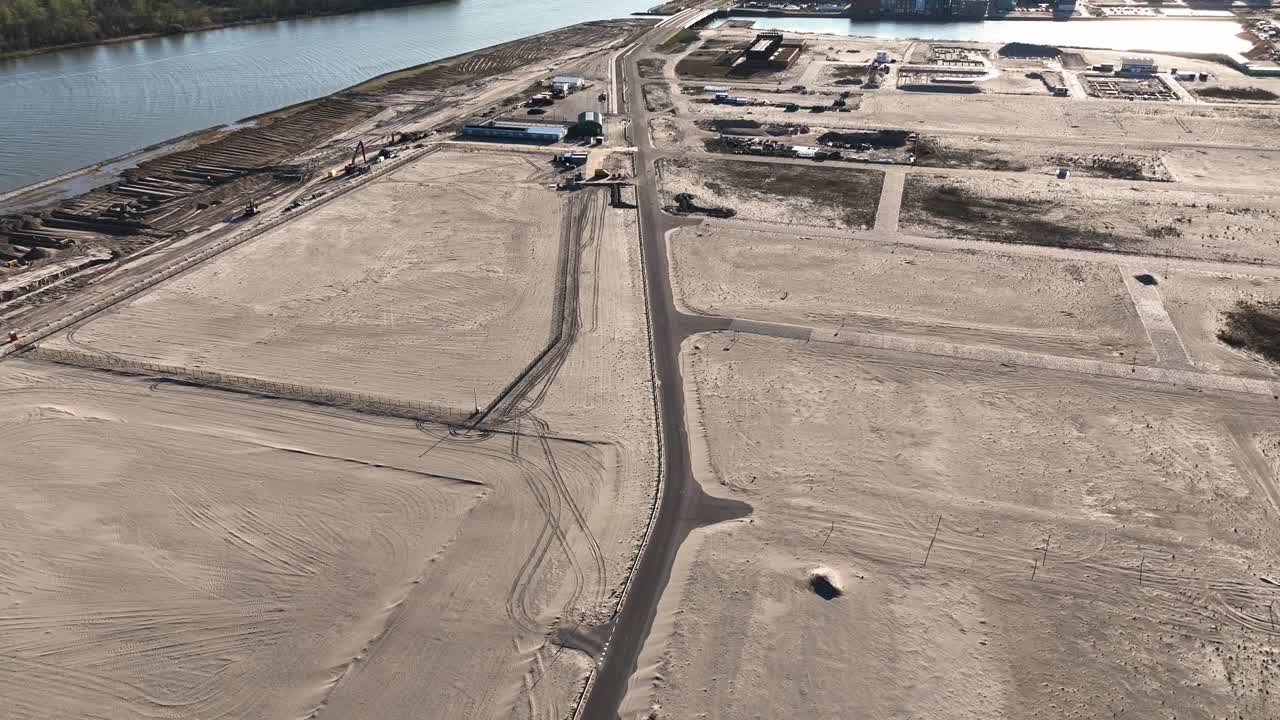 Drone video of an asphalt road on sand surface